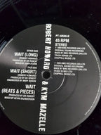 Dr Robert & Kym Mazelle – Wait!