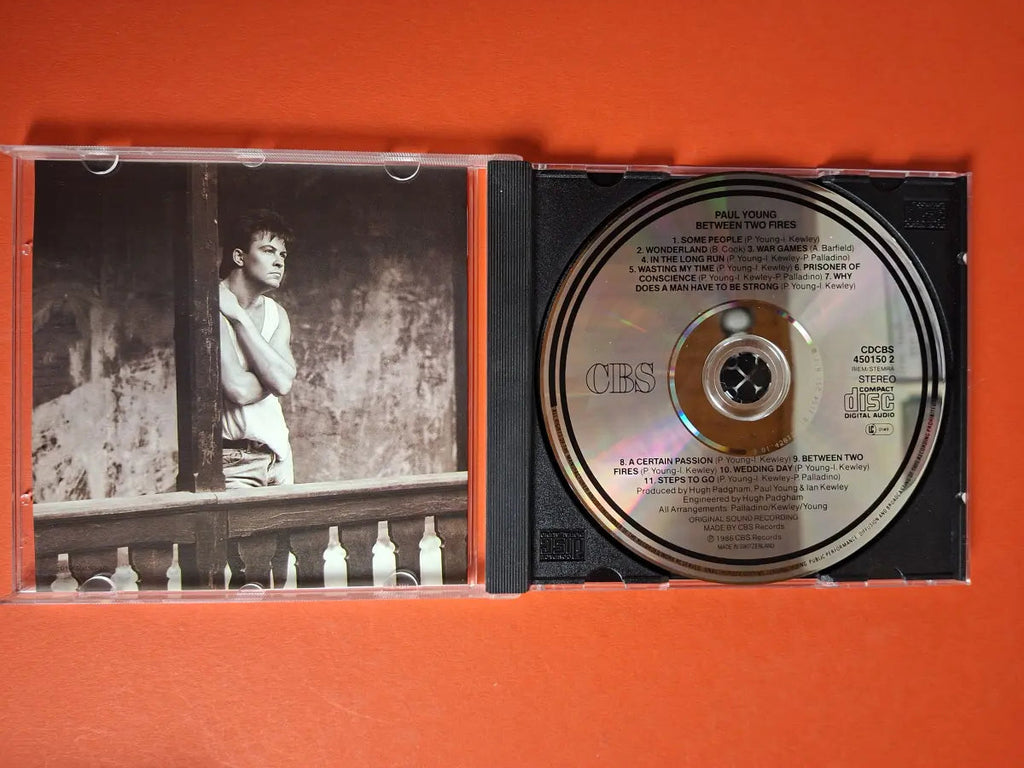 Paul Young – Between Two Fires