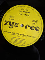 The Fans – Olé, Olé, Olé (The Name Of The Game)