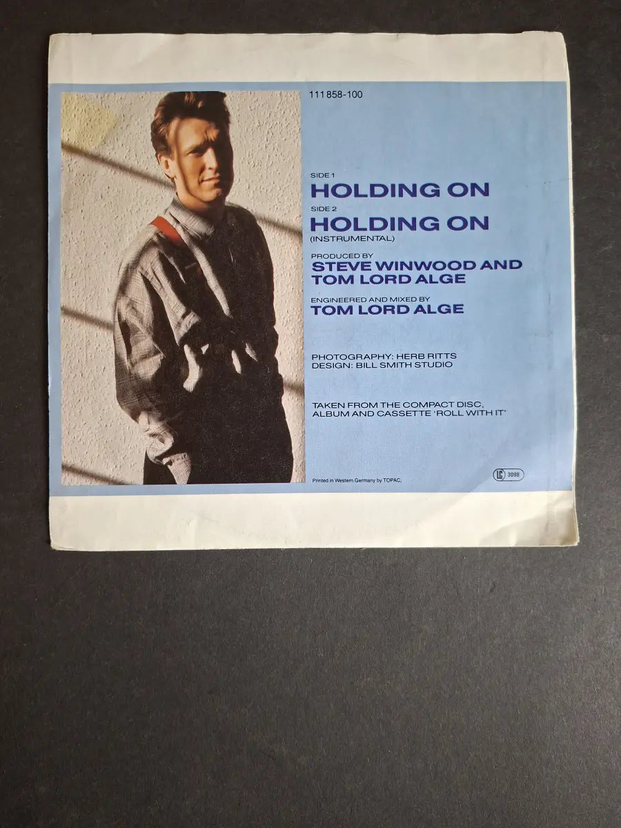 Steve Winwood – Holding On